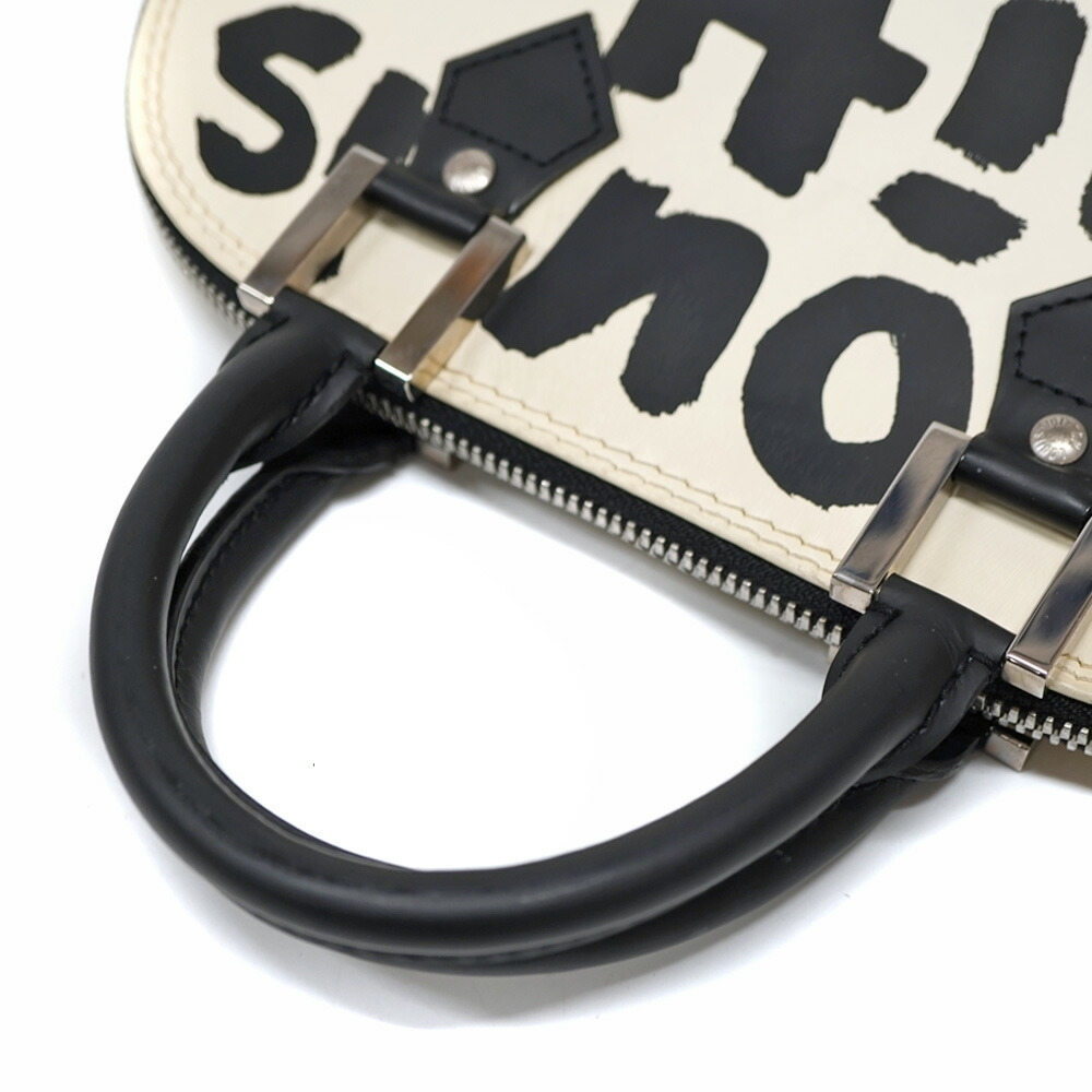 Louis Vuitton Alma Black White Bag - Picture 8 of 9